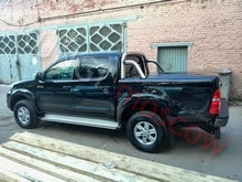 Крышка кузова Euro star с черной дугой для пикапа Toyota Hilux (2 положения открывания 45 и 90 гр.) окрашенная в любой цвет