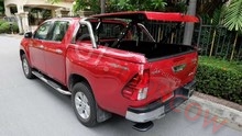 Крышка кузова Euro star с черной дугой для пикапа Toyota Hilux (2 положения открывания 45 и 90 гр.) окрашенная в любой цвет