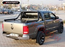 Крышка VW Amarok сдвижная, типа "рольставни" с черной дугой 76 мм. Action